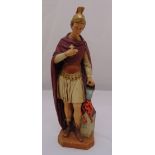 A hand painted plaster figurine of a Roman Soldier stamped on raised octagonal base, 43cm (h)