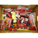 A quantity of play worn diecast cars, trucks and fire engines to include Dinky, Matchbox,