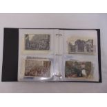 An album of vintage postcards 1900 to 1927 to include Greater London, South Devon and WWI scenes
