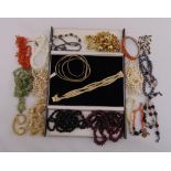 A quantity of costume jewellery to include necklaces and a bracelet