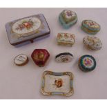 Eight porcelain pill and patch boxes of various size and shape, a rectangular hinged covered box and