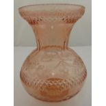 A peach glass vase of baluster form etched with flowers and leaves, 30cm (h)