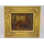 A framed early 19th century oil on board of an interior scene with child lighting the pipe of a