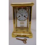 Rapport 8 day gilded metal and glass mercury balance mantle clock, white enamel dial, Roman