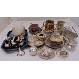 A quantity of silver plate to include a cased condiment set, a wine funnel and various trays
