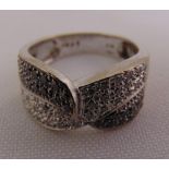 18ct white gold pave set black and white diamond ring, approx total weight 9.4g