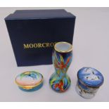 Moorcroft enamel vase, a Moorcroft enamel covered box and a Bilston enamel patch box