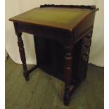 An oak Davenport of customary form with tooled leather hinged top and five drawers, 81 x 62.5 x