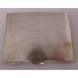A silver engine turned cigarette case, approx total weight 169g
