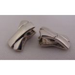 A pair of 9ct white gold bow shaped earrings, approx total weight 4.9g