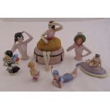 A quantity of continental half dolls and pin cushions (7)