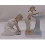 Two Lladro figurines of children, marks to the bases, 19cm (h)