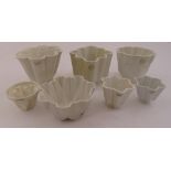 Seven Shelley ceramic jelly moulds of varying shape