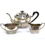 A silver plated 3-piece tea set of half-fluted form