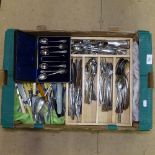 A part canteen of Continental stainless steel cutlery, cased cutlery etc