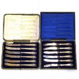 2 cased sets of silver-handled tea knives