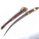 An Eastern knife with horn handle, length 50cm, with leather-covered scabbard