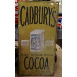 A Vintage embossed and painted tin sign, advertising Cadbury's Cocoa Essence, height 117cm