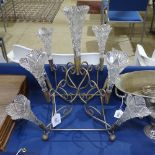 An Edwardian 9-branch epergne, with cut-glass trumpets on plated stand