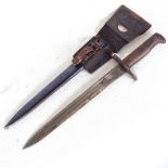 A German First War rifle bayonet and scabbard, stamped Waffenfabrik Neuhausen, no. E.366, blade