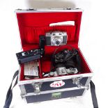 2 Canon cameras, an Agfa camera, and camera accessories