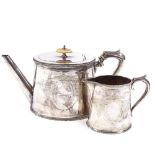 An Elkington & Co silver plated oval teapot and cream jug, ivory insulators with floral engraved