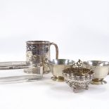 Various silverware, comprising christening mug, pair of 2-handled salts, Eastern embossed salt and