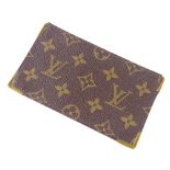 A Louis Vuitton monogram card holder/wallet, serial no. 873/RA, 15cm x 9cm