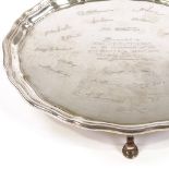 A George V circular silver salver, with ribbed scalloped rim, by Adie Brothers Ltd, hallmarks