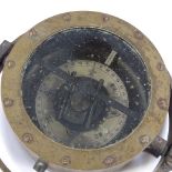 A brass-cased ship's compass in gimballed mount, serial no. 2958E
