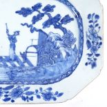 A Chinese 18th century blue and white porcelain meat plate, decorated with a figure on a raft,