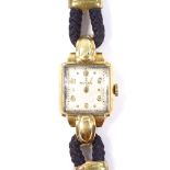 ROLEX - a lady's 18ct gold Precision mechanical wristwatch, champagne dial with gilt Arabic and