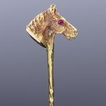 A 9ct gold ruby figural horsehead stick pin, maker's marks C and F, hallmarks London 1977, overall