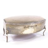 A George V silver jewel box, bowed rectangular form with interior gilt lid and felt lining, by E S