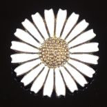 An Anton Michelsen Danish vermeil sterling silver and white enamel daisy brooch, maker's marks AM,
