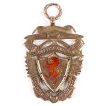 A 9ct rose gold Scottish Amateur Rowing Association medal, with enamelled rampant lion, dated