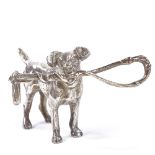 An Edwardian Continental novelty miniature cast-silver model hunting pointer dog holding a riding