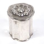 An 18th century German silver snuffbox, with relief embossed floral lid and marks to base, height