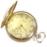 An Art Deco gold plated full hunter pocket watch, by Favor, champagne dial with gilt Arabic numerals