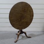 A 19th century circular mahogany tripod table, 2'10" across