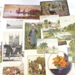 A folder of watercolours and prints