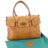 A Mulberry Bayswater tan leather handbag, with padlock and key, serial no. 565321, with dust bag