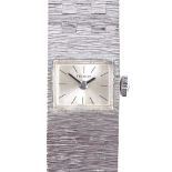 TISSOT - a lady's stainless steel mechanical cocktail wristwatch, silvered dial with baton hour