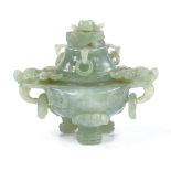 A Chinese green hardstone incense burner and cover, with dragon ring handles, height 11cm, width