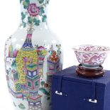 A Chinese white glaze porcelain vase, with painted enamel designs, height 43cm, rim A/F, and a