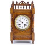 A Victorian carved oak-cased mantel clock, 8-day movement striking on a bell, height 32cm