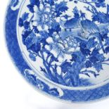 A Chinese blue and white porcelain plate with hand painted exotic birds, 4 character mark,
