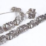 A 1960s silver floral demi parure, comprising necklace, bracelet and ring, by Langstone Silver