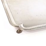 A large square silver tray, scalloped corners, by Thomas Bradbury & Sons Ltd, hallmarks Sheffield