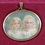A Victorian miniature watercolour on ivory, portrait of 2 young girls, in original 9ct gold oval